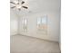 Bright bedroom with vaulted ceilings, plush carpet and natural light from shuttered windows at 4305 Kendall Way, Roswell, GA 30075