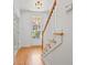 Welcoming entryway with hardwood floors and staircase leading to the upper level at 4305 Kendall Way, Roswell, GA 30075