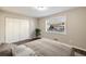 Inviting bedroom with a large window, hardwood floors, and ample closet space for comfortable living at 449 Clairemont Ave # E1, Decatur, GA 30030