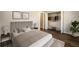 Cozy bedroom features plush bedding, modern decor, and a spacious closet for ample storage at 449 Clairemont Ave # E1, Decatur, GA 30030
