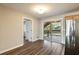Dining room with hardwood floors, view of deck and stainless steel refrigerator at 449 Clairemont Ave # E1, Decatur, GA 30030