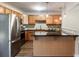 Modern kitchen featuring stainless steel appliances and granite countertops at 449 Clairemont Ave # E1, Decatur, GA 30030
