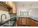 Modern kitchen with granite countertops and stainless steel sink at 449 Clairemont Ave # E1, Decatur, GA 30030