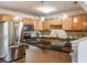 Modern kitchen with stainless steel appliances and granite countertops at 449 Clairemont Ave # E1, Decatur, GA 30030