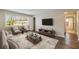 Bright living room with large window, hardwood floors, and modern furnishings perfect for relaxation and entertaining at 449 Clairemont Ave # E1, Decatur, GA 30030