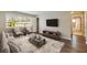 A beautifully designed living room features hardwood floors, modern furniture, and access to a bathroom at 449 Clairemont Ave # E1, Decatur, GA 30030