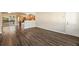 Open floor plan with new floors, seamlessly connecting the living room and kitchen at 449 Clairemont Ave # E1, Decatur, GA 30030