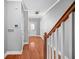 View of the entryway displaying hardwood floors, neutral walls, and white trim at 1094 N Village Dr, Decatur, GA 30032