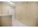 Hallway with neutral paint, white trim, and carpet at 1094 N Village Dr, Decatur, GA 30032