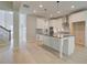 Bright kitchen featuring white cabinets, stainless steel appliances, a center island, and hardwood floors at 226 Linford Dr, Locust Grove, GA 30248