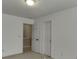 Cozy bedroom with a walk-in closet and white doors, offering ample storage at 2650 Richfield Pl, Cumming, GA 30040