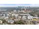 Aerial view of 50 Biscayne Dr NW # 211T, featuring a skyline view and nearby shopping centers at 50 Biscayne Nw Dr # 2111, Atlanta, GA 30309