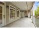 Large covered balcony provides outdoor living space with shade at 50 Biscayne Nw Dr # 2111, Atlanta, GA 30309