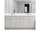 Bathroom featuring a double sink vanity, white cabinets, and tiled floor at 50 Biscayne Nw Dr # 2111, Atlanta, GA 30309