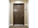 Solid brown entry door to a unit at 50 Biscayne Nw Dr # 2111, Atlanta, GA 30309