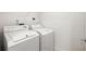 Neat laundry room with washer and dryer hookups at 50 Biscayne Nw Dr # 2111, Atlanta, GA 30309