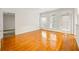 Hardwood floors, white walls, windows with wooden shutters, and natural light at 50 Biscayne Nw Dr # 2111, Atlanta, GA 30309