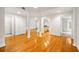 Spacious living room featuring hardwood floors and columns at 50 Biscayne Nw Dr # 2111, Atlanta, GA 30309