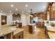 Large kitchen with custom wood cabinetry, stainless steel appliances, and an island for food preparation at 5284 Vernon Springs Trl, Sandy Springs, GA 30327