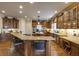 Spacious kitchen with a large island, granite countertops, and stainless steel appliances at 5284 Vernon Springs Trl, Sandy Springs, GA 30327