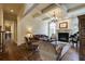 Comfortable living room with hardwood floors, fireplace, and coffered ceiling at 5284 Vernon Springs Trl, Sandy Springs, GA 30327