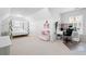 Spacious bedroom featuring a unique four poster bed and a well-lit desk area at 426 Highcrest Dr, Acworth, GA 30101