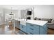 Open kitchen with a large island, stainless steel appliances, farmhouse sink and hardwood floors at 426 Highcrest Dr, Acworth, GA 30101