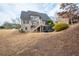 Back of house with a large backyard and a multilevel deck, offering stunning views at 426 Highcrest Dr, Acworth, GA 30101