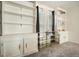 Bright living room with built-in shelving and natural light at 582 Black Forest Run, Douglasville, GA 30134