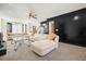 Spacious living room with plush seating and view of entry and staircase at 582 Black Forest Run, Douglasville, GA 30134