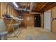 Unfinished basement area with exposed wooden beams, utilities, and potential for customization at 582 Black Forest Run, Douglasville, GA 30134