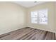 This vacant bedroom offers a neutral color scheme and two windows for ample natural light at 653 Armitage Way, Stockbridge, GA 30281