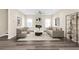 Cozy living room with a fireplace, modern furniture, and wood-look flooring at 653 Armitage Way, Stockbridge, GA 30281