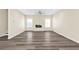 Spacious living room with a fireplace, and wood-look flooring at 653 Armitage Way, Stockbridge, GA 30281