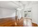 Bright and airy living room with hardwood floors, modern lighting, and access to outdoor space at 955 Juniper Ne St # 1016, Atlanta, GA 30309