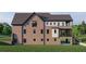 Brick house with siding, back porch, basement entrance, and stairway at 1338 Wayne Ne Ave, Atlanta, GA 30306