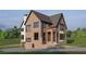 Beautiful brick home showcasing a modern design with a mix of materials and large windows at 1338 Wayne Ne Ave, Atlanta, GA 30306