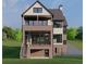 Home with a porch, brick and siding exterior, back entrance to basement, and stairs at 1338 Wayne Ne Ave, Atlanta, GA 30306