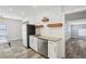 Charming kitchen with stainless steel appliances, granite countertops, and white cabinets at 1694 Kenmore Sw St, Atlanta, GA 30311