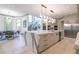 Open concept kitchen with large island and stainless appliances, and adjacent breakfast area at 3451 Paces Valley Nw Rd, Atlanta, GA 30327