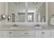 Bathroom with double sink vanity and views into the clear glass shower and soaking tub at 3601 Ridgeway Rd, Duluth, GA 30096