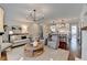 Cozy living room with modern lighting, fireplace, and stylish furnishings at 3601 Ridgeway Rd, Duluth, GA 30096