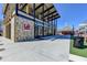 Exterior view of a burger restaurant with outdoor seating and modern design elements at 3601 Ridgeway Rd, Duluth, GA 30096