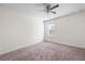 Spacious bedroom with neutral carpet and ceiling fan at 813 Whittington Sw Pkwy, Marietta, GA 30060