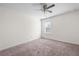Spacious bedroom with carpeted floor, ceiling fan, and a window at 813 Whittington Sw Pkwy, Marietta, GA 30060