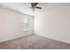 Cozy bedroom featuring neutral carpet and a ceiling fan at 813 Whittington Sw Pkwy, Marietta, GA 30060