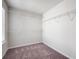Spacious walk-in closet features carpeted floors and wire shelving for optimal storage at 813 Whittington Sw Pkwy, Marietta, GA 30060