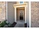 Charming front entrance with brick accents and a well-maintained walkway at 813 Whittington Sw Pkwy, Marietta, GA 30060