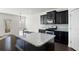 This kitchen features granite counters, dark cabinets and stainless appliances at 813 Whittington Sw Pkwy, Marietta, GA 30060