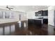 Open concept kitchen features dark cabinets, a granite island and stainless steel appliances at 813 Whittington Sw Pkwy, Marietta, GA 30060
